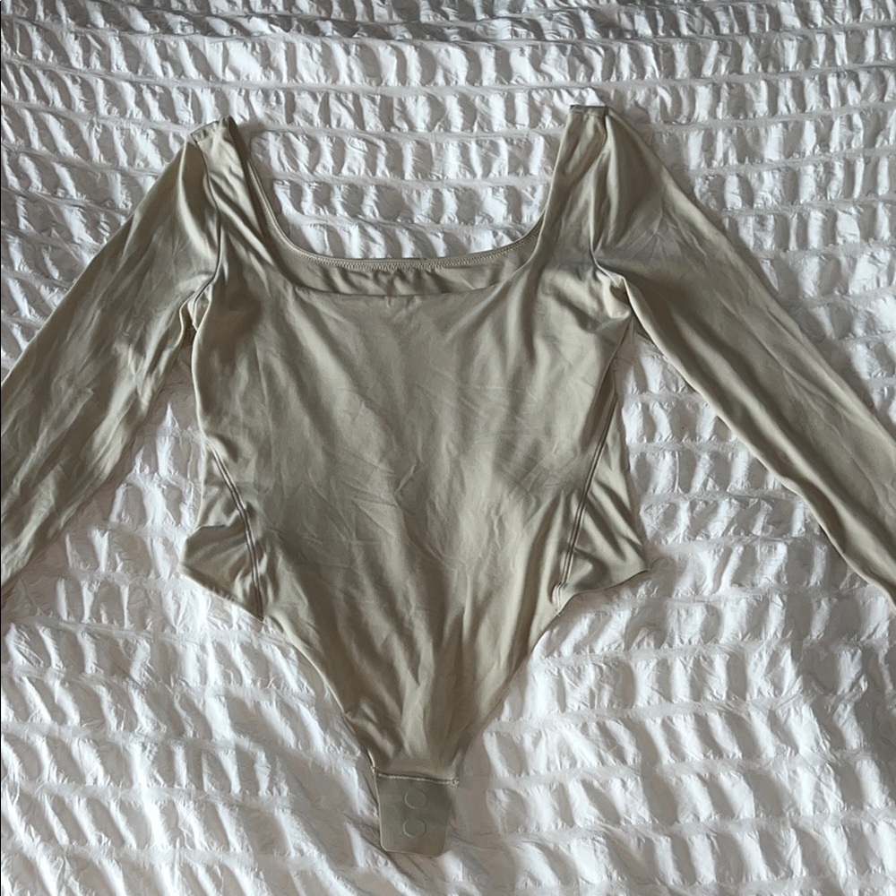 Lululemon Elegant Cream Long Sleeve Bodysuit